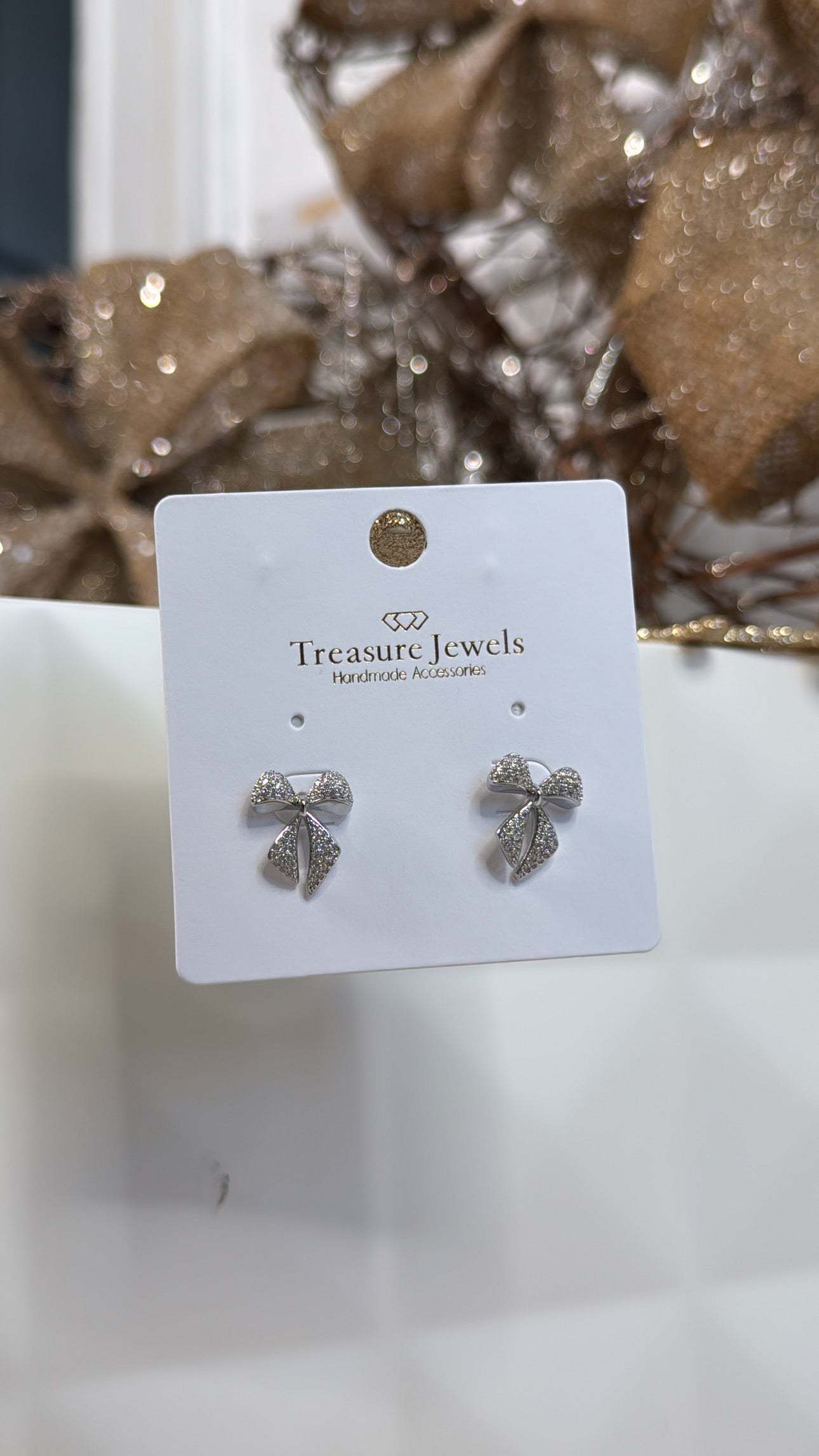 Treasure Jewels: Twinkle Bow Earring Silver