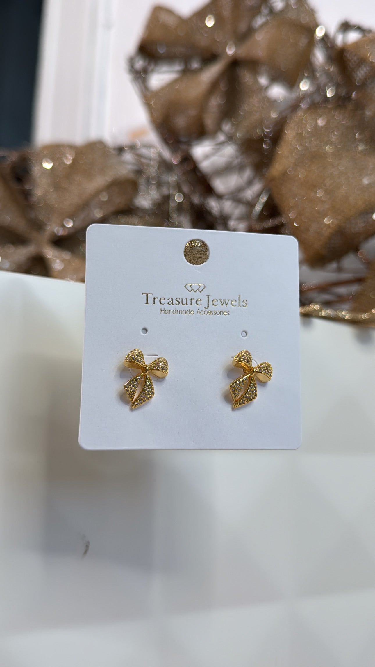 Treasure Jewels: Twinkle Bow Earring Gold