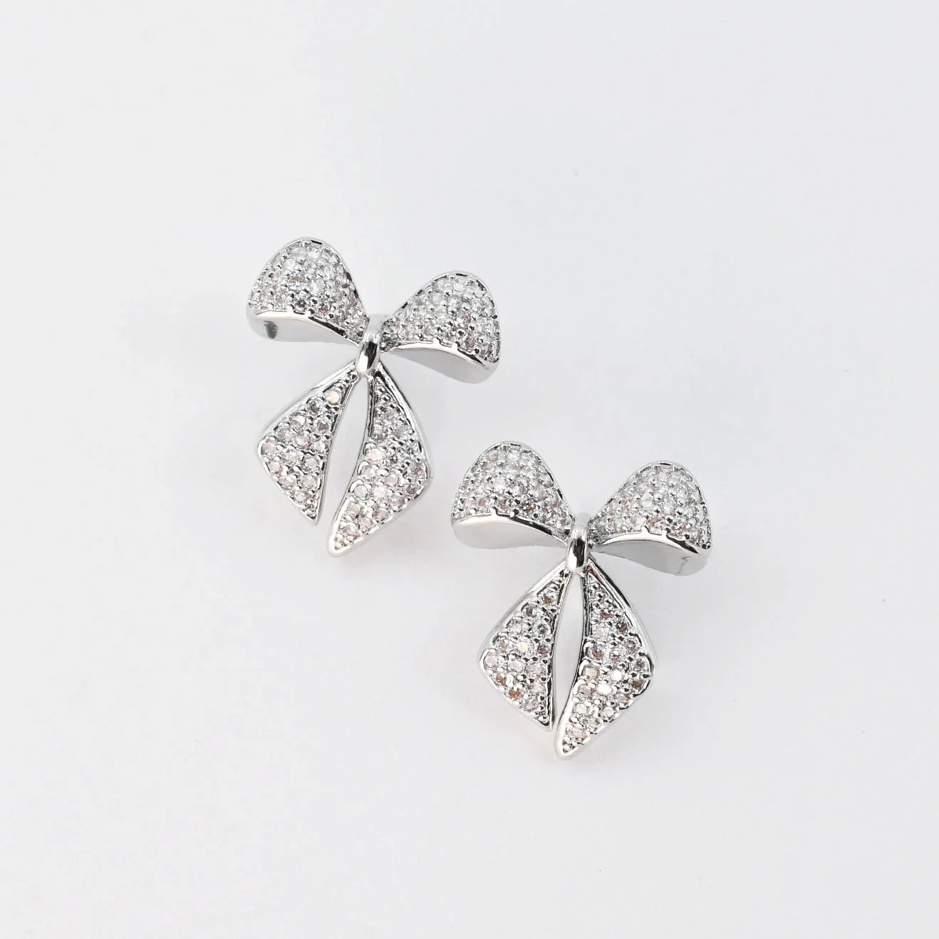 Treasure Jewels: Twinkle Bow Earring Silver