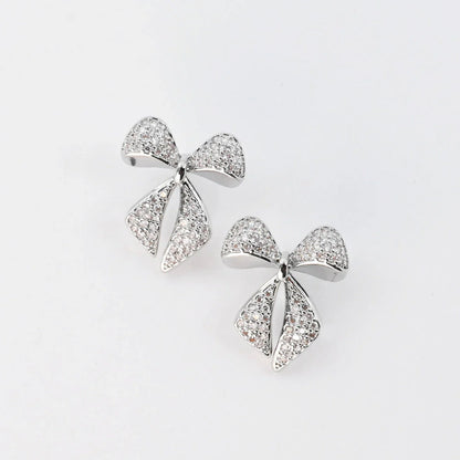 Treasure Jewels: Twinkle Bow Earring Silver